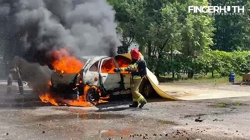 EV Car Fire Blanket in a realistic vehicle fire scenario
