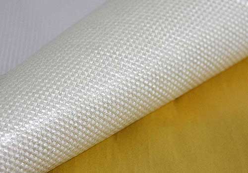 Self-adhesive foil for E-glass fabrics